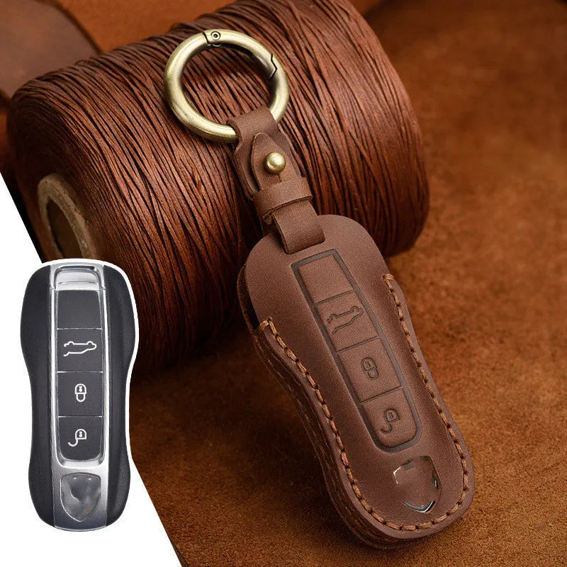 Genuine cowhide leather Porsche key case with retro bag-style buckle in blue or brown colour options