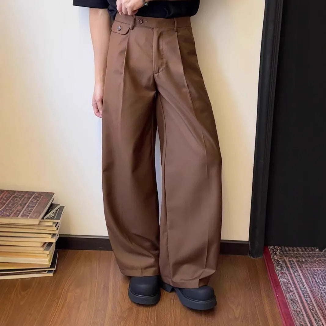 Men's straight-leg casual trousers in polyester blend fabric showing drape and wider cut design