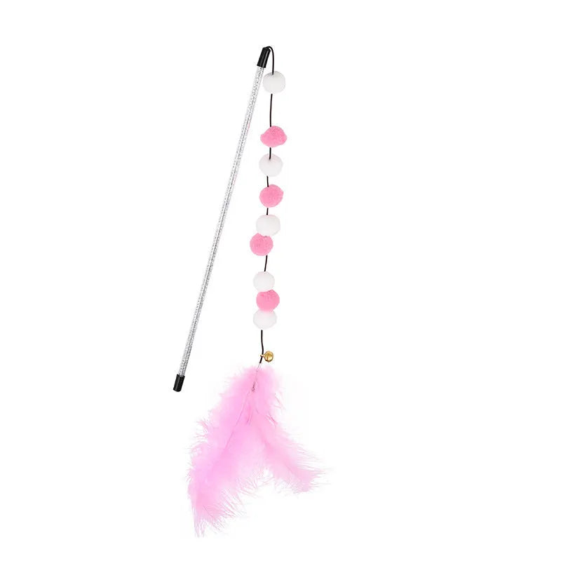 Grey and yellow cat teaser stick with a bell and a pompon feather, shown next to a blue and pink version.