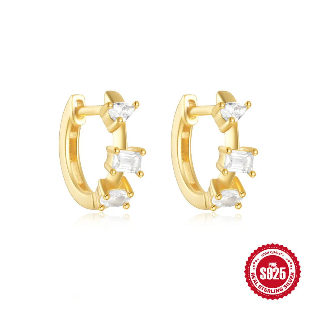 Sterling silver geometric stud earrings with small round diamond detailing in gold and silver electroplated finishes