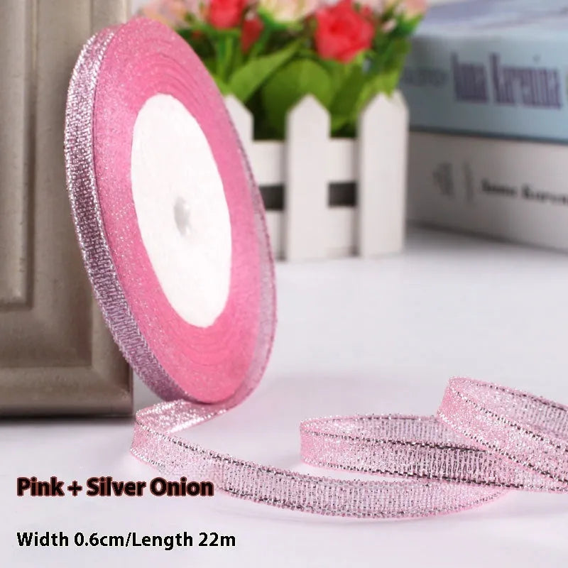 Roll of polyester gift ribbon showing 0.6cm width and multiple colour options including metallic finishes