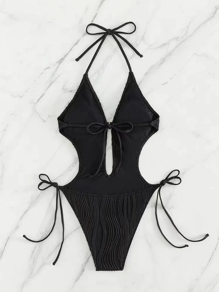 Women's black triangle bikini swimsuit with front lace-up closure