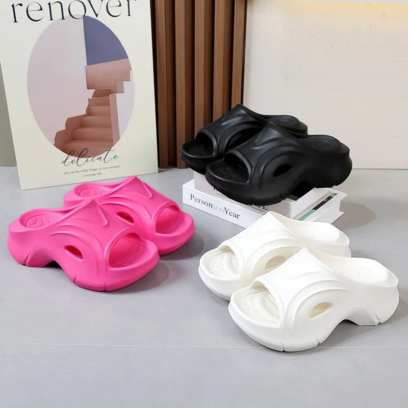 Women's thick-soled EVA slippers in rose red colour showing round toe design