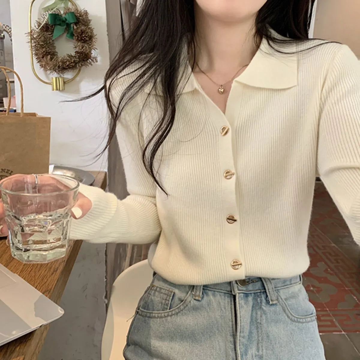 Women's long sleeve loose fit knitted cardigan in viscose fibre, shown in beige colour.