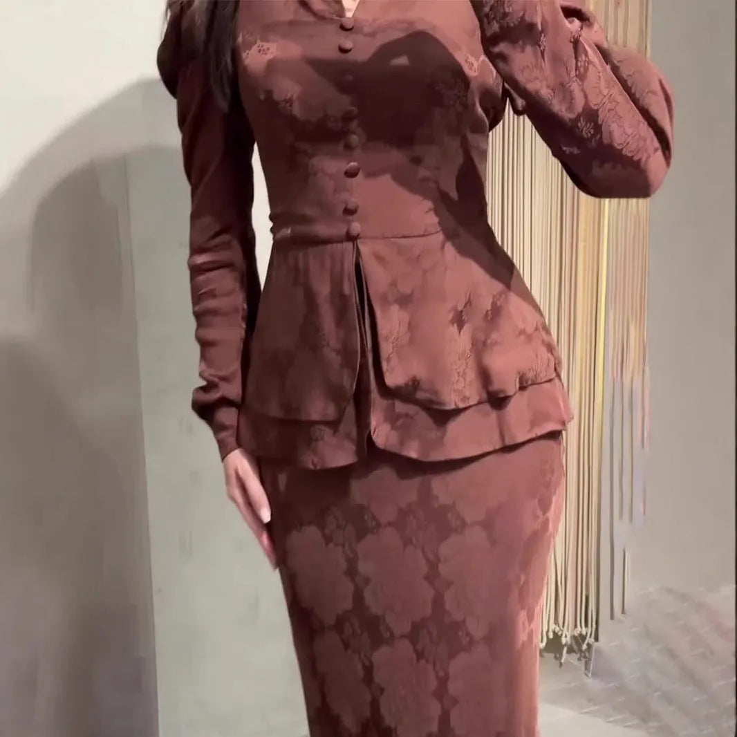 Dark brown artistic retro long sleeve pullover dress with plant pattern and button detail.