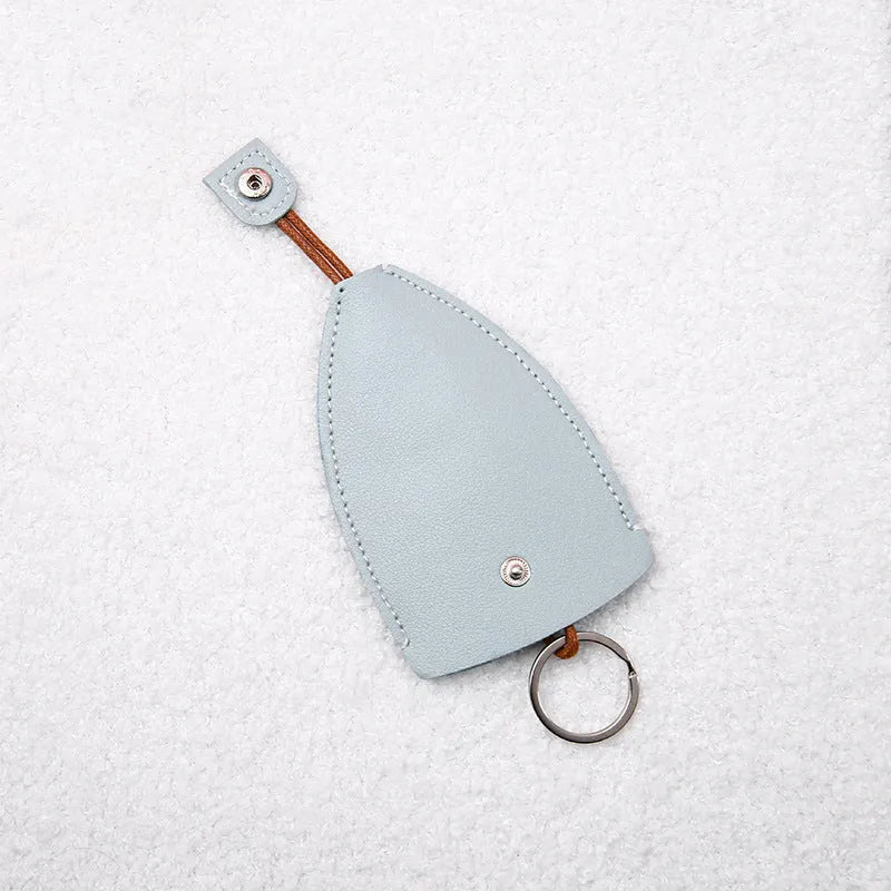 Cartoon pull-out car key case in PU leather with colourful designs measuring 14 x 7.5 cm