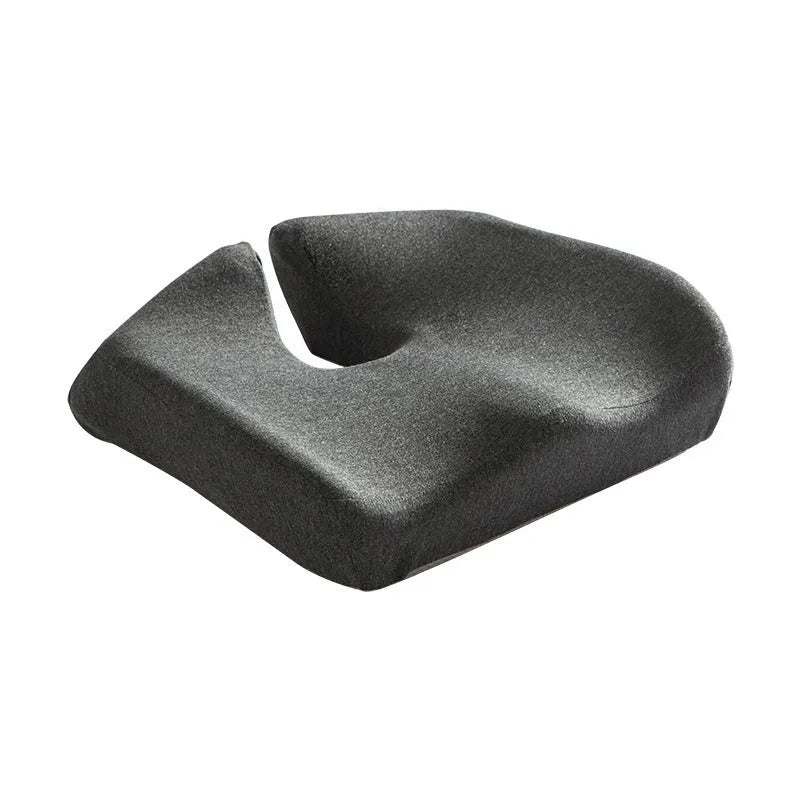 Black memory foam office chair cushion with dimensions 36x40cm on a grey desk chair