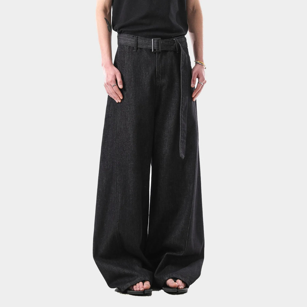 Black high-waist straight-leg denim jeans on a neutral background.