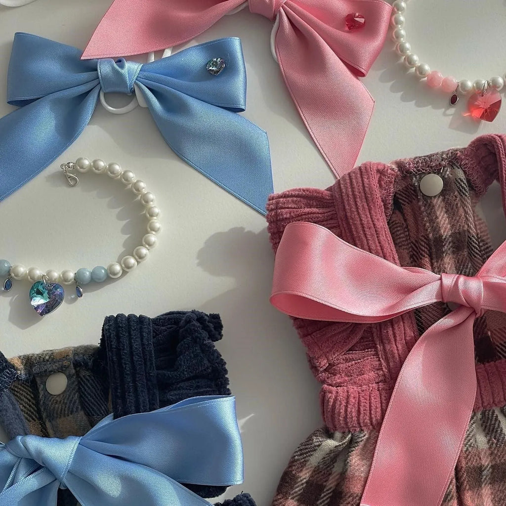 Dog wearing princess style bow hair band with tension adjustment on head