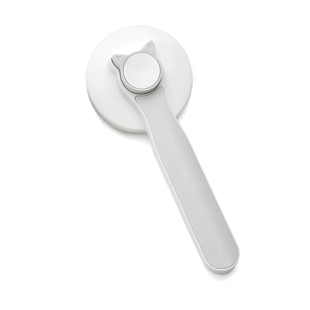 Blue self-cleaning pet grooming brush with ergonomic rubber handle on a white background