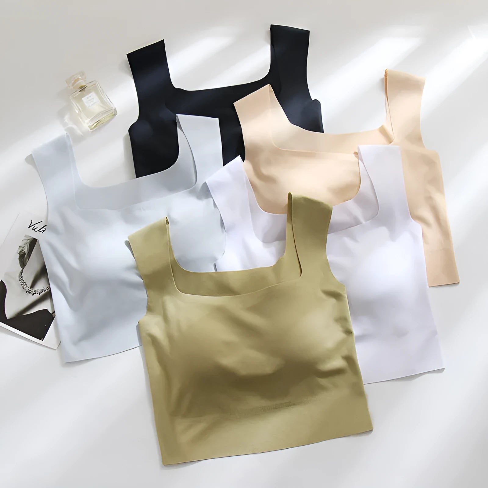 Women's non-marking sling vest with chest pad in nylon fabric, shown in light blue colour