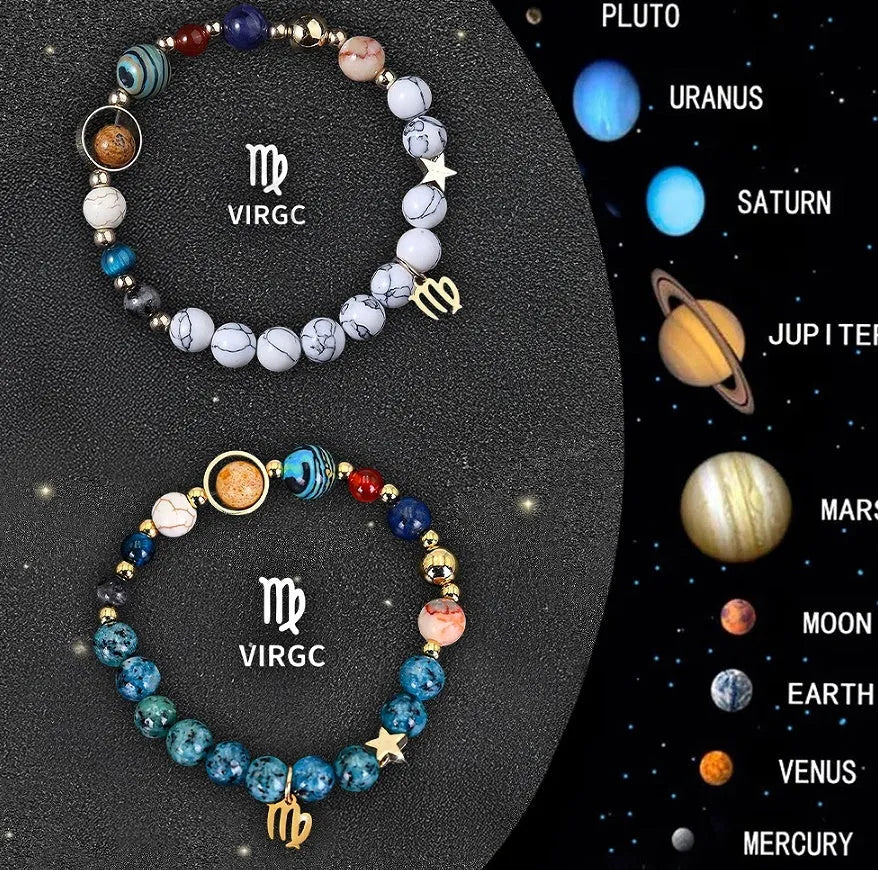 Set of twelve natural stone beaded bracelets for each zodiac sign arranged together.