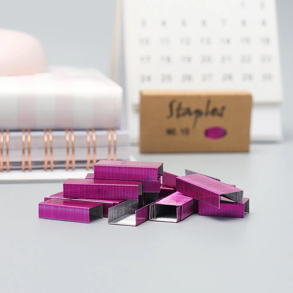 Box of 1000 metal stapling needles in rose gold, black, purple, and rose red colour options.
