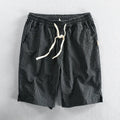 Men's striped casual shorts in cotton with elastic waistband shown in multiple colour options