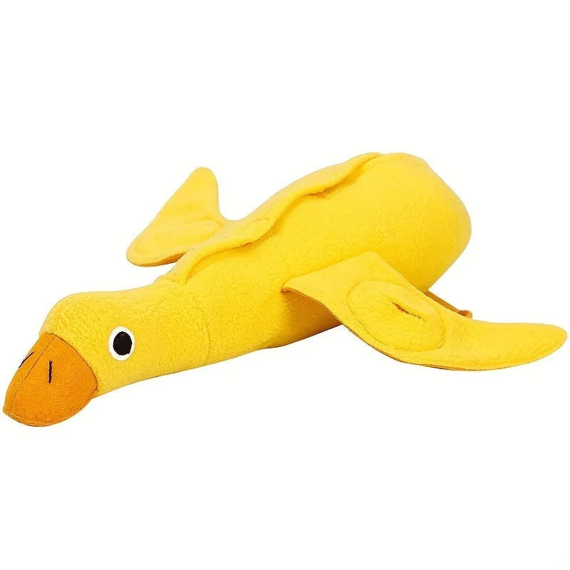 Yellow plush duck dog toy with treat holes and sound module for training and chewing