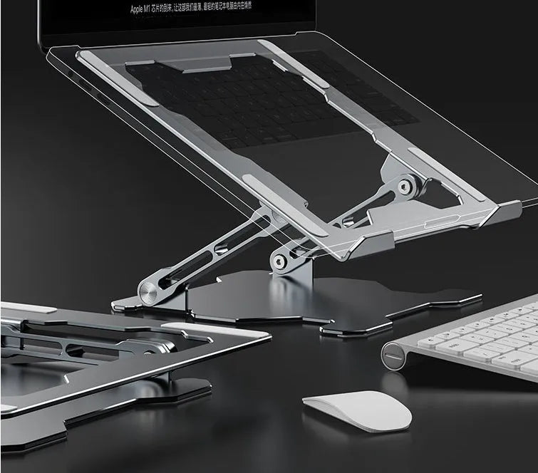 Grey aluminum laptop stand shown at an adjustable angle, folded flat, and holding a silver laptop.