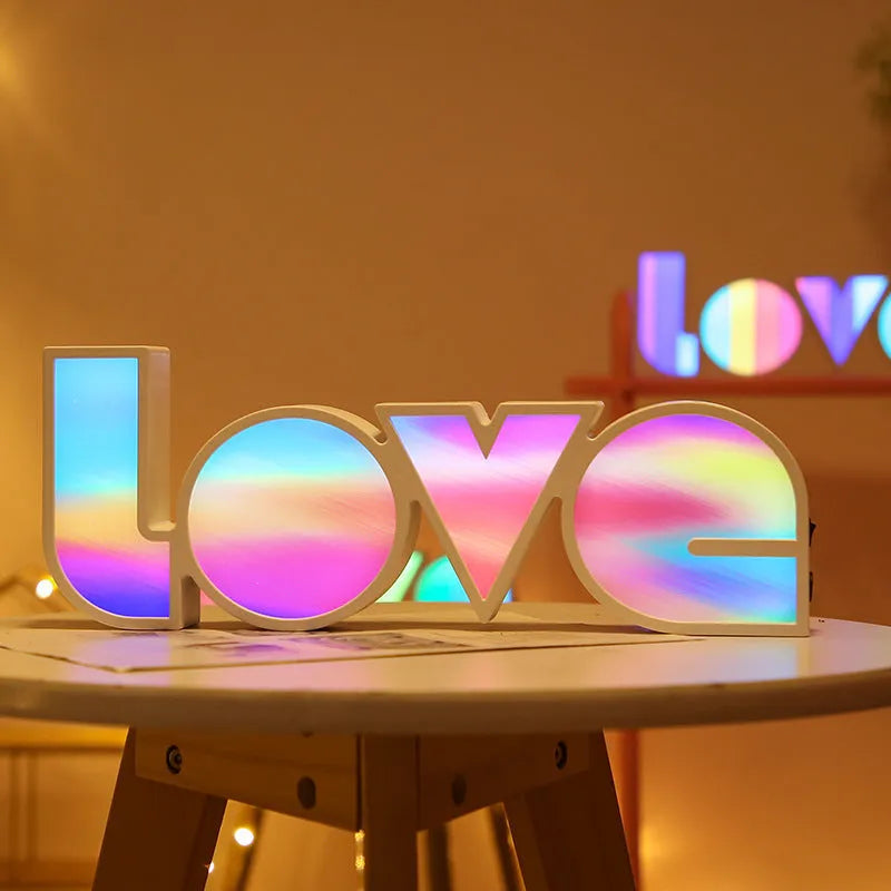 Rainbow style LED LOVE light decoration with plastic shell measuring 35.5cm by 13.5cm