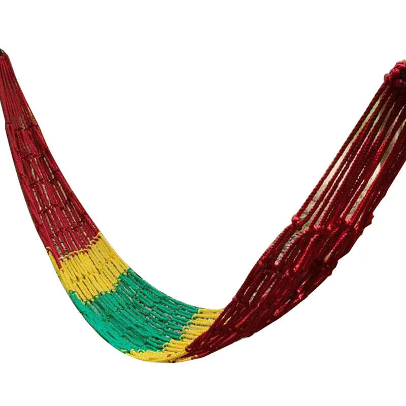 Outdoor nylon rope mesh hammock hanging between two trees, showing its woven construction and spacious 1.1m by 2.1m size.