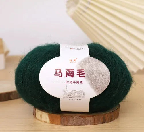 Single ball of mohair yarn in various colours for hand-woven DIY scarf knitting projects