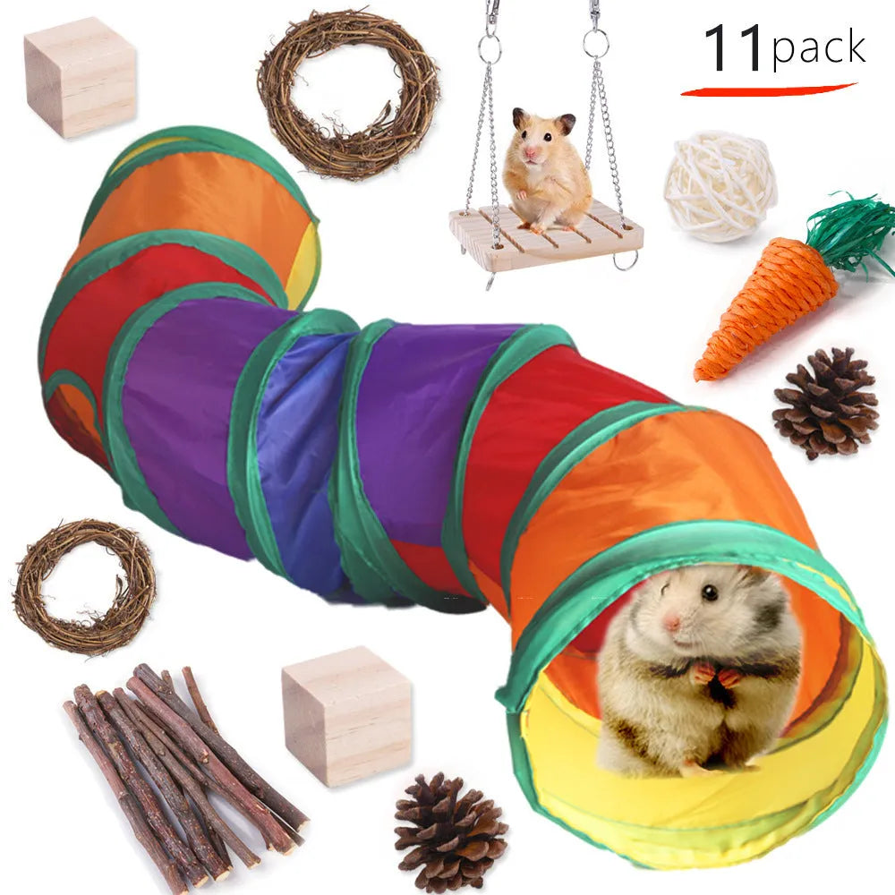 Assortment of wooden and natural fibre chewing toys for pet rabbits, guinea pigs, and parrots on a straw mat