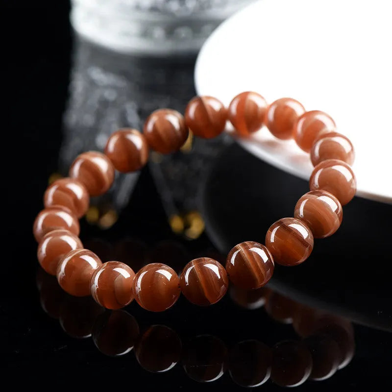 Natural Old Mine Rhodochrosite round beads bracelet with Ruyi design elements