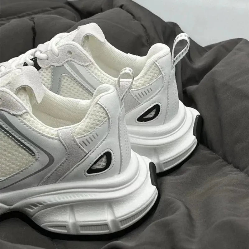 Beige mesh platform sports shoes with wedge muffin heel and lace-up front.