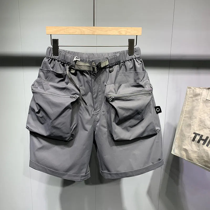 Men's black loose fitting workwear shorts with pockets, above-the-knee length with straight leg design