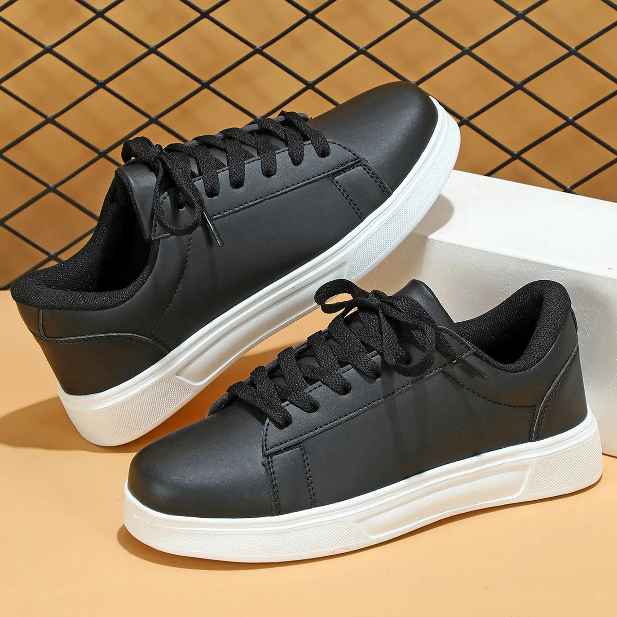 Low-top platform skate shoes with cross-strap detail and mid-heel design in beige brown colour
