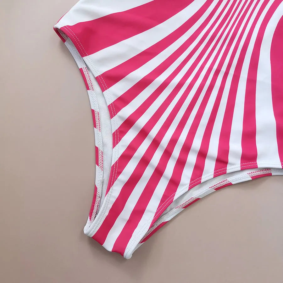 Women's pink striped one-piece swimsuit with digital print on front and back.