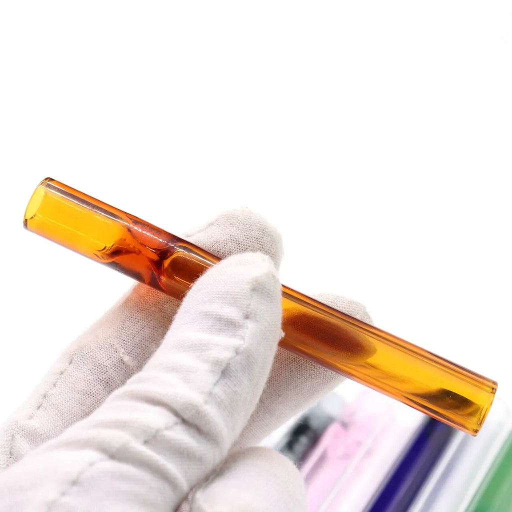 Straight transparent glass telescopic smoke pipe nozzle on a plain background.