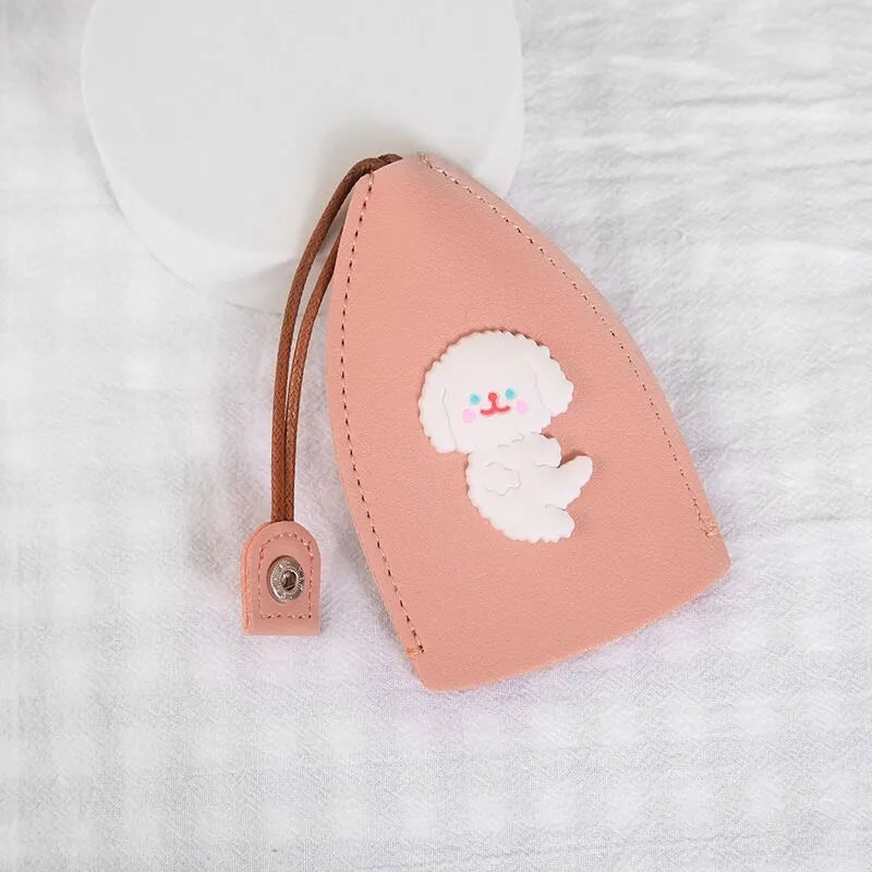 Cartoon pull-out car key case in PU leather with colourful designs measuring 14 x 7.5 cm