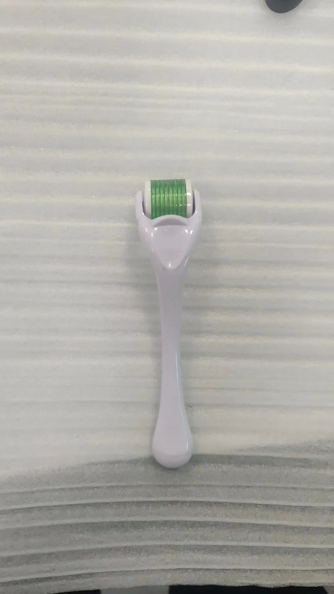 540 micro needle dermaroller roller with black handle and coloured wheel showing needle specification