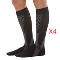 Athletic fit graduated compression socks for men and women in black, shown on a leg.