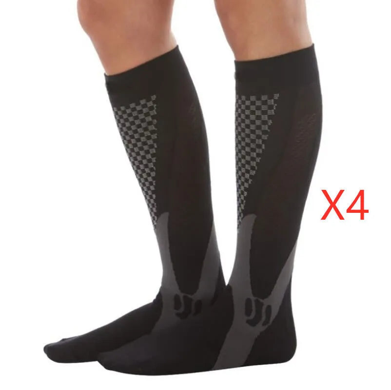 Athletic fit graduated compression socks for men and women in black, shown on a leg.
