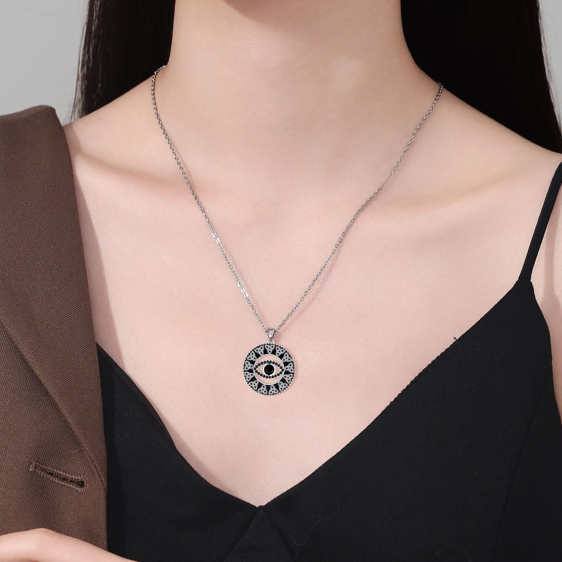 Devil's Eye necklace for women with copper pendant and cross chain in electroplated silver-tone finish