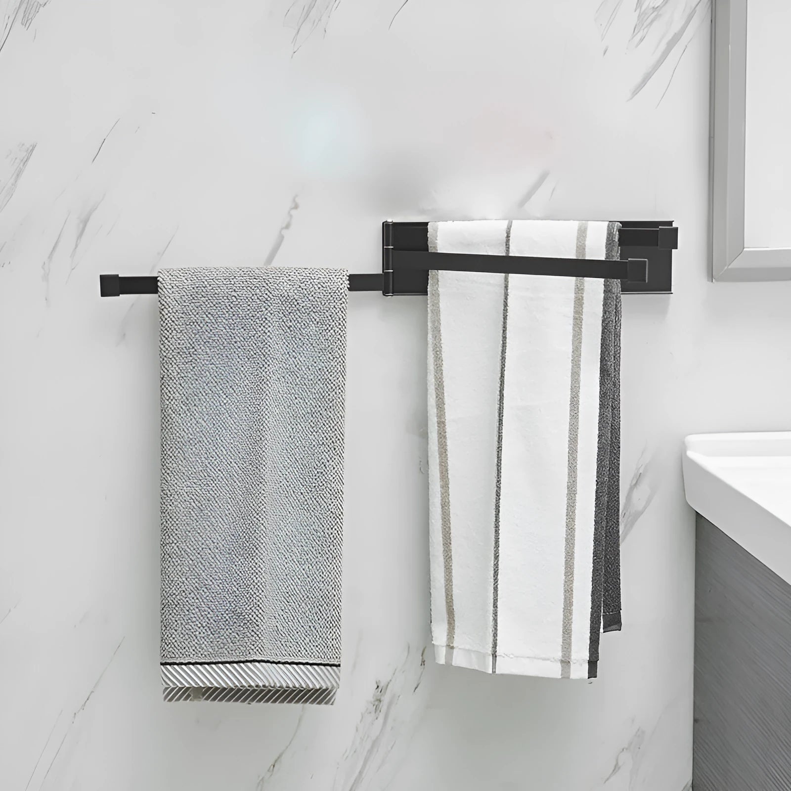 Nordic folding towel bar in black or white with carbon steel anti-rust construction for no-drill bathroom installation