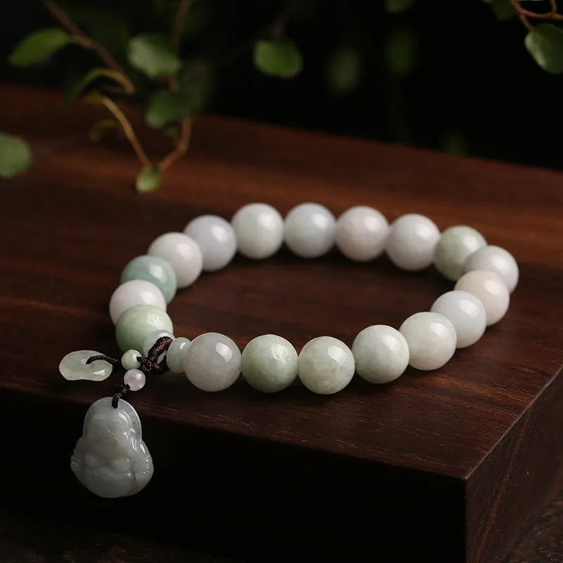 Natural emerald jade geometric bracelet with Maitreya Buddha, apple, and money bag hanging charms.