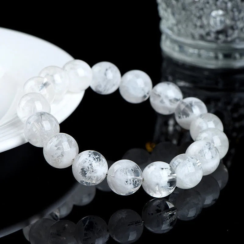 Women's crystal bracelet with natural blizzard snowflake round beads and ruyi xiangyun design elements