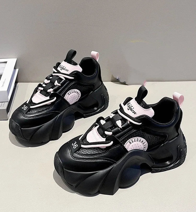 Women's casual sneakers in beige with thick sole, cross shoulder straps, and mesh lining.