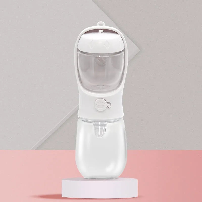 Portable dual-use dog drinking cup showing water dispenser and separate grain bowl compartment