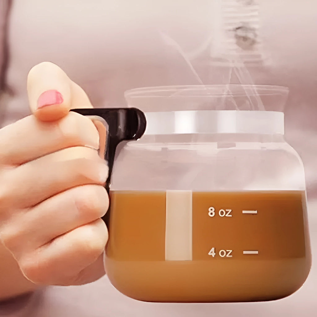 Transparent borosilicate glass coffee maker with blue silicone cover for pour-over brewing