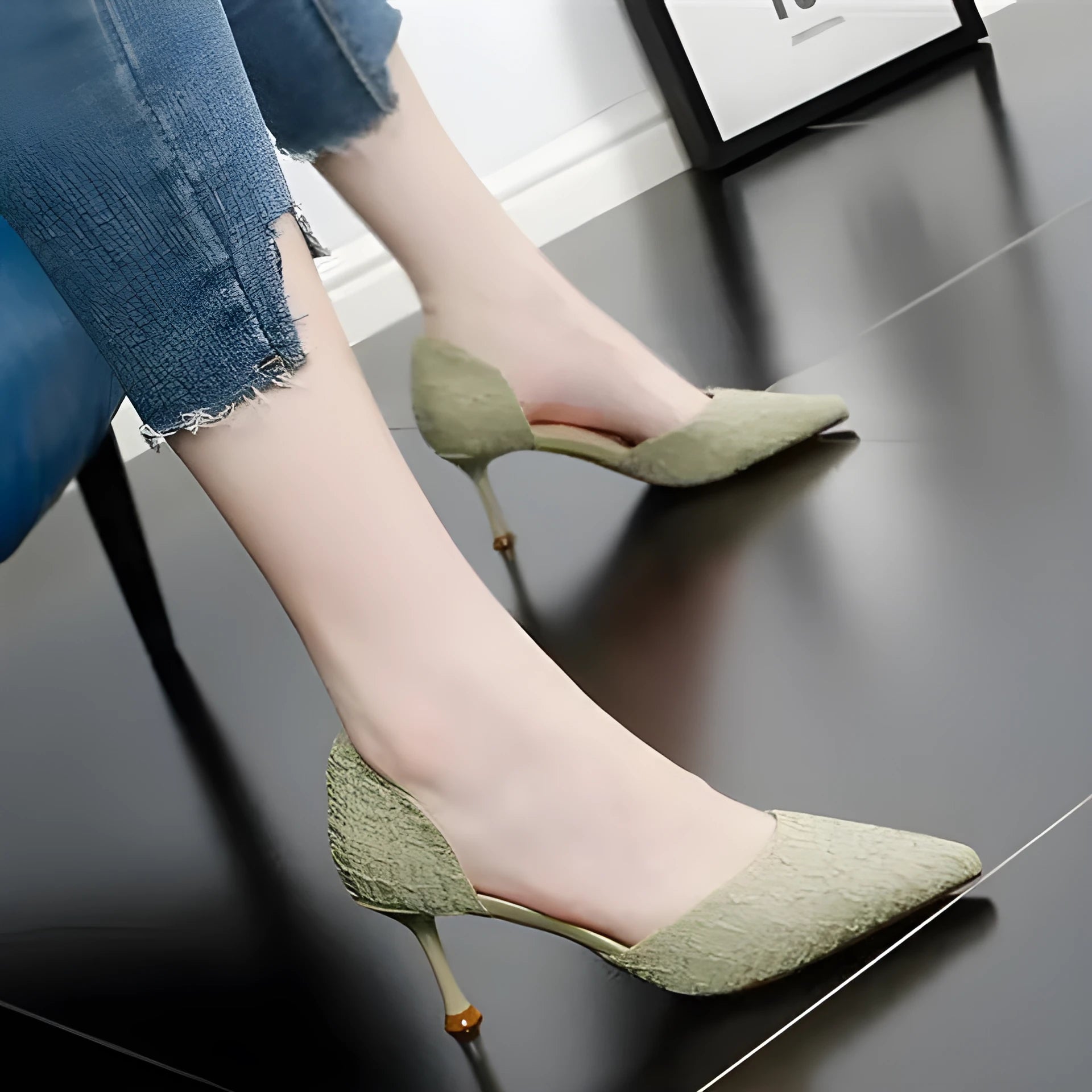 Women's pointed toe stiletto heels with sheepskin and cowhide stitching detail on the upper and rubber sole.