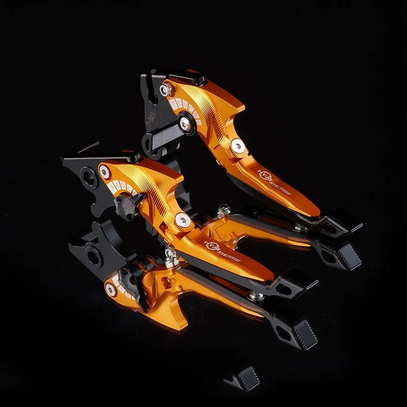Pair of anodised metal motorcycle brake and clutch levers with adjustable length mechanism