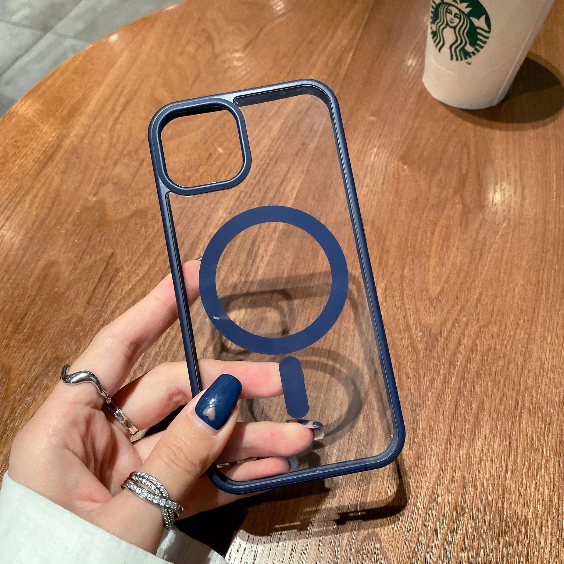 Transparent acrylic MagSafe phone case for iPhone showing magnetic ring and clear design