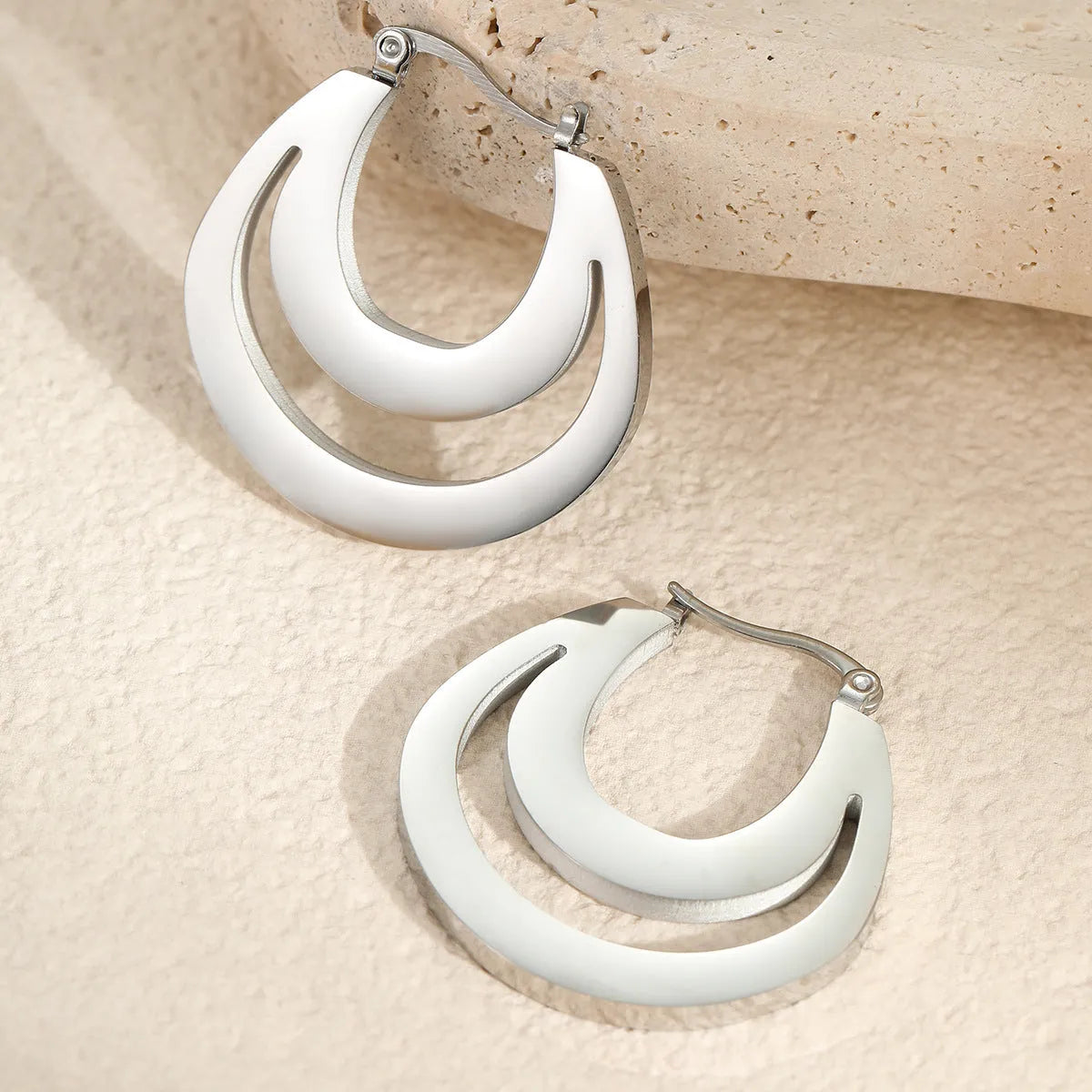 Geometric French earrings with round ring design in gold metallic finish