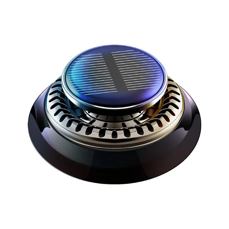 Solar-powered kinetic car air freshener with rotating double rings on car dashboard