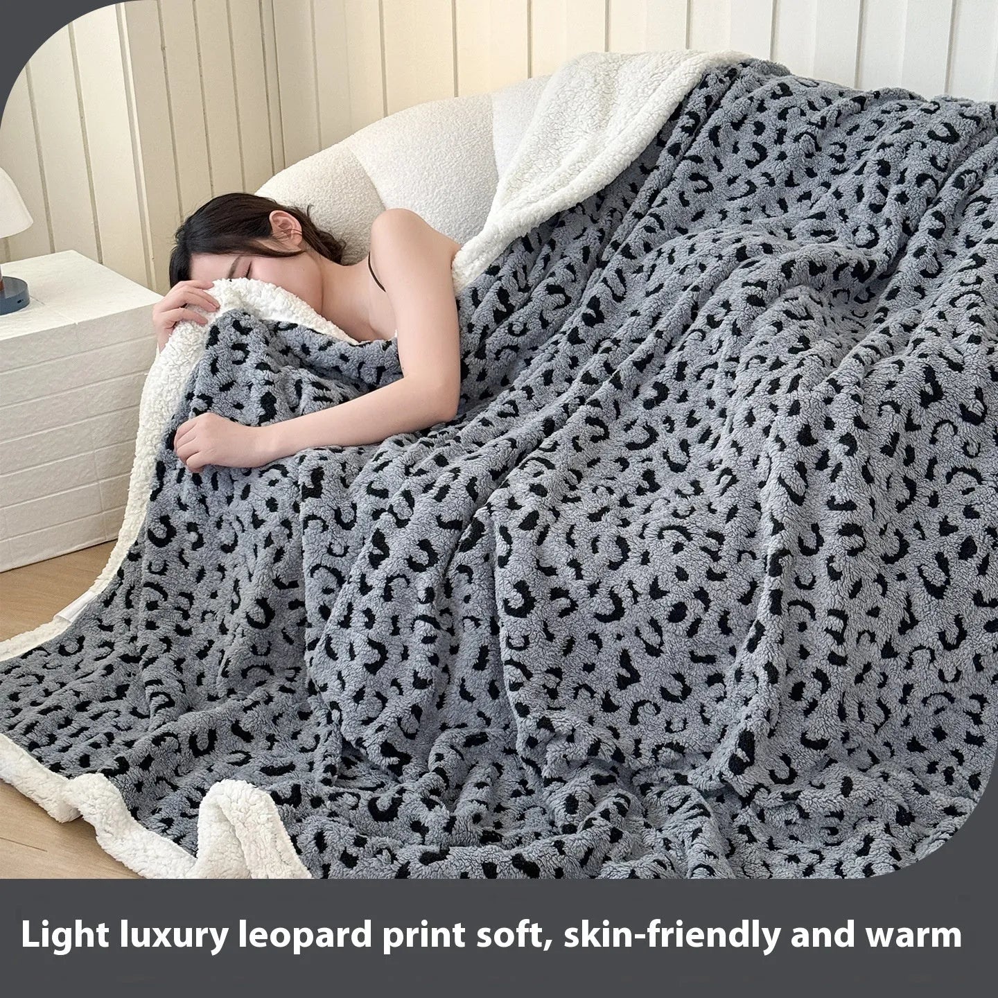 Double-layer Jacquard taffeta blanket with leopard print design in camel colour folded to show texture and pattern detail