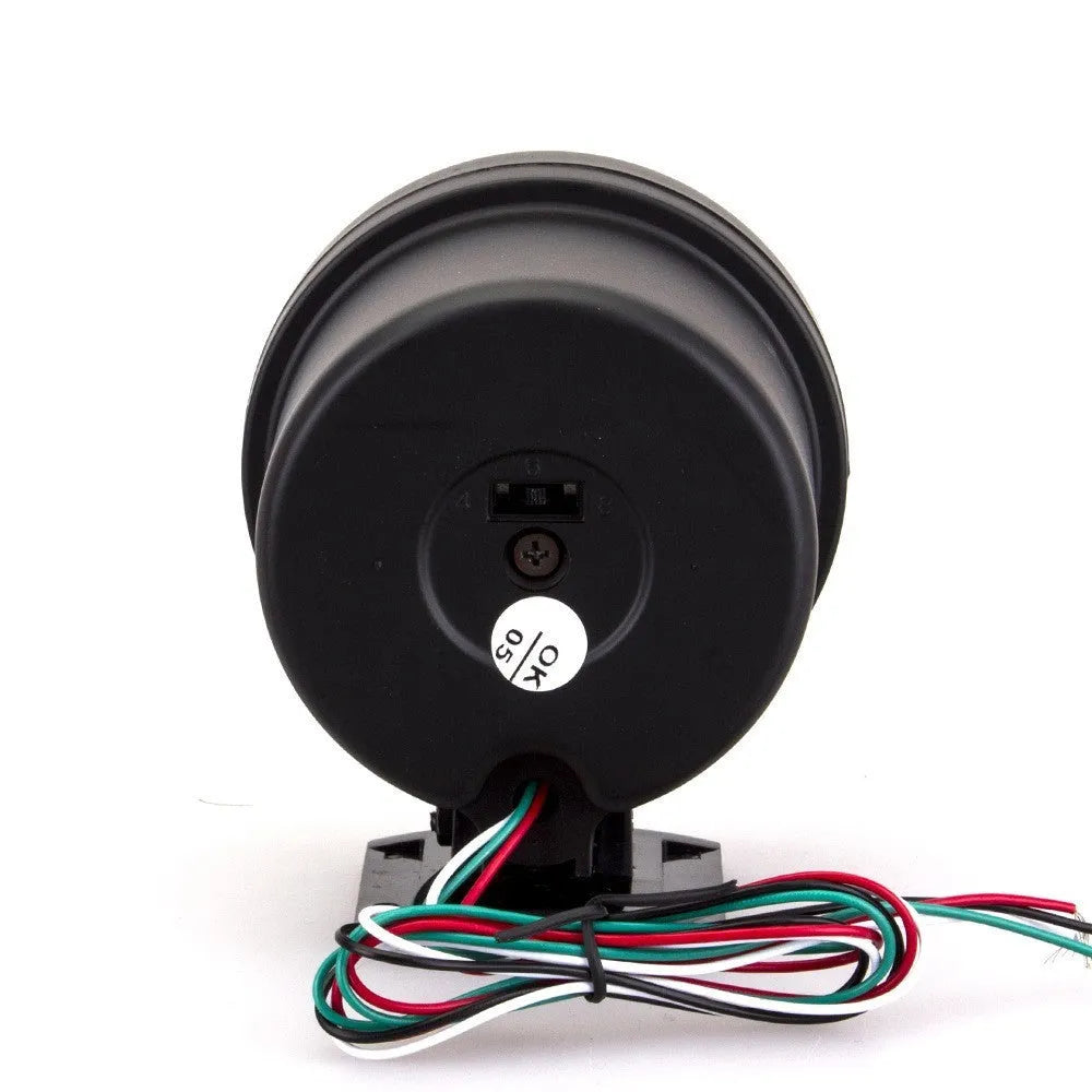 Black automotive tachometer with blue light pointer display showing RPM measurement scale