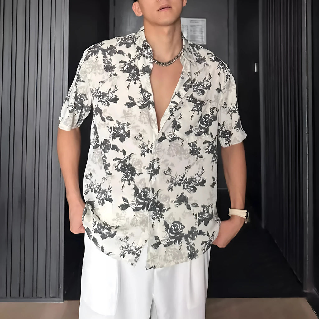 Loose casual short sleeve shirt with floral pattern in black or white colour options