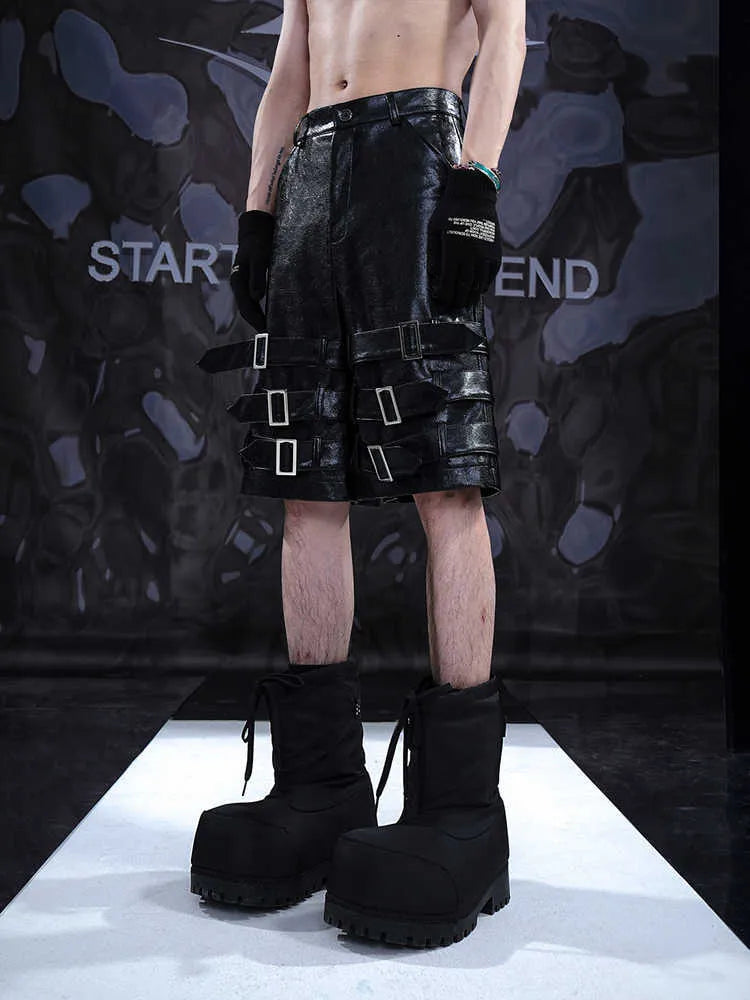 Men's black leather ring casual cropped pants in polycarbaminate fabric showing medium-low waist design